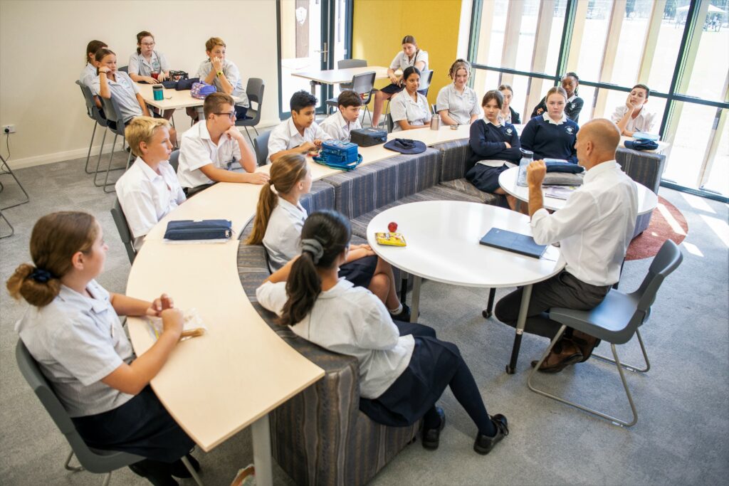 Students working at desks in a HASS classroom